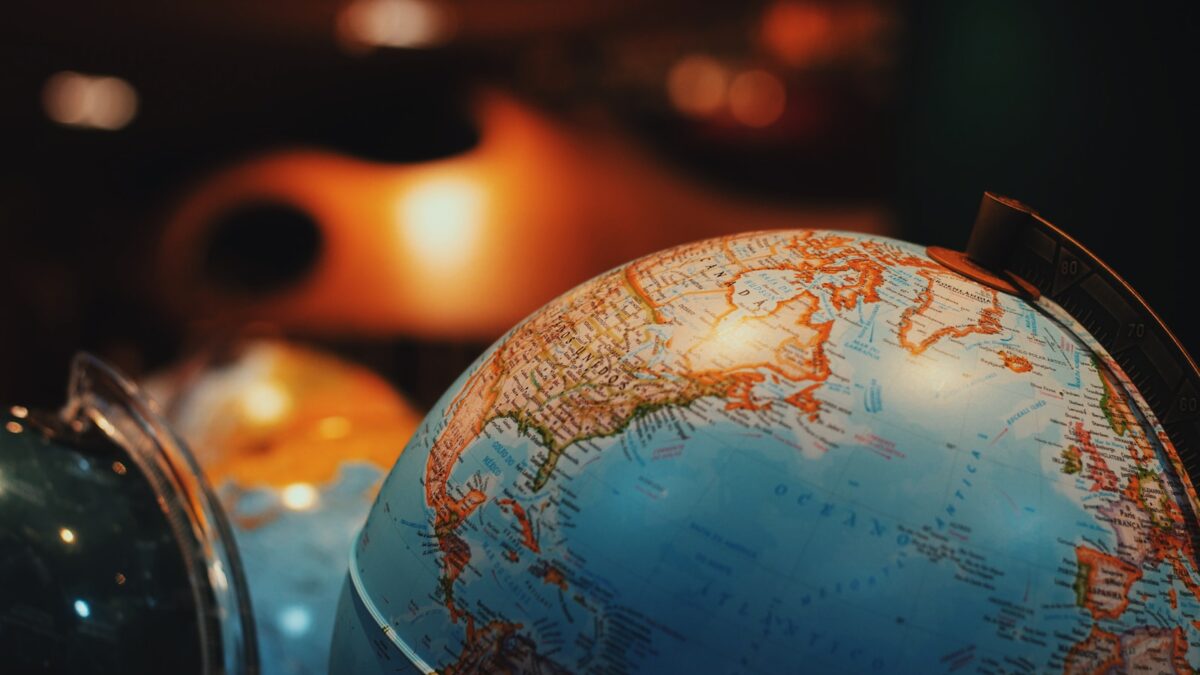 selective focus photo of terrestrial desk globe